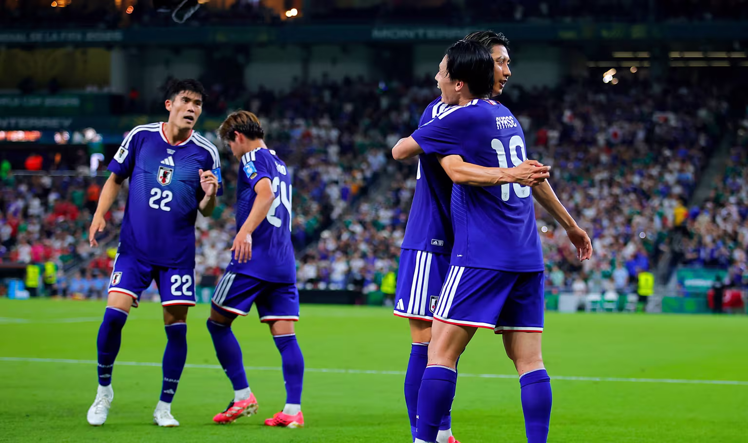 Ayase Ueda of Japan celebrates with teammates after scoring the team s second goal during the FIFA World Cup 2026 Group F match between Tunisia and Japan