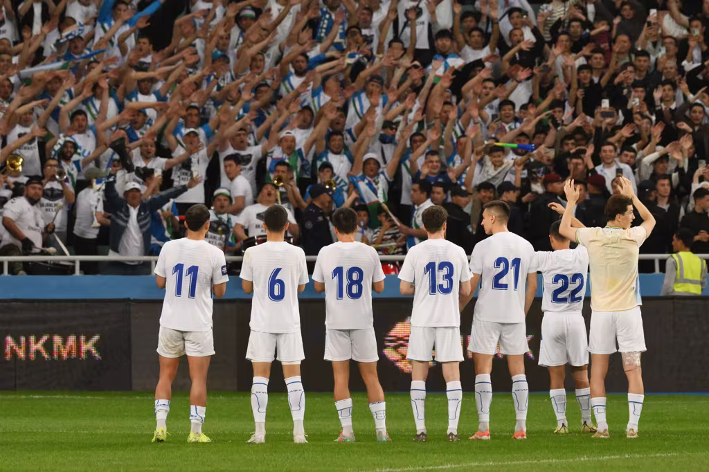 Uzbekistan players greet supporters after a FIFA Series 2026 match against Gabon
