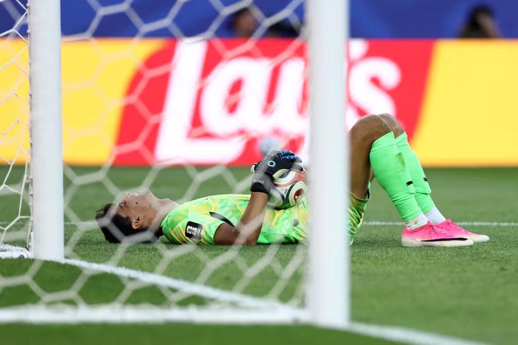 Yassine Bounou reacts after catching the ball during the 2026 World Cup Group C football match between Scotland and Morocco at the Boston Stadium