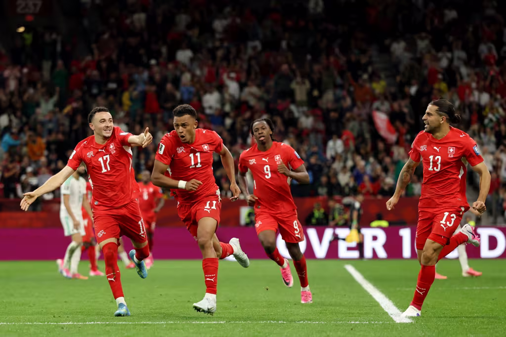 Dan Ndoye of Switzerland celebrates with teammates after scoring the team s second goal during the FIFA World Cup 2026 Round of 32 match between Switzerlan