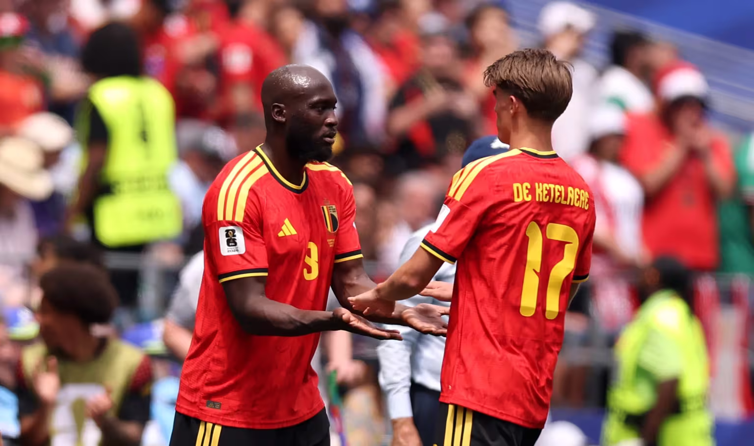 Romelu Lukaku 9 of Belgium high fives Charles De Ketelaere 17 as he is substituted during the FIFA World Cup 2026 Group G match between Belgium and Egypt